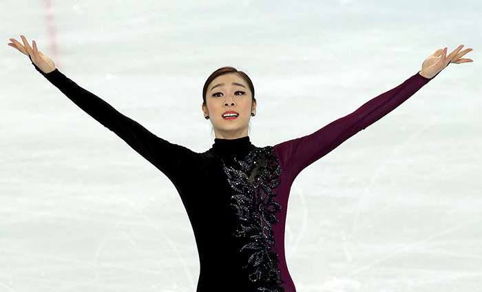 ‘피겨 여왕’ 김연아가 20일 자신의 은퇴무대인 ‘2014 소치 동계올림픽’ 여자 피겨스케이팅 싱글 프리 스케이팅 경기를 마치고 두 팔을 벌려 관중들을 향해 인사하고 있다. (사진제공: 대한체육회)