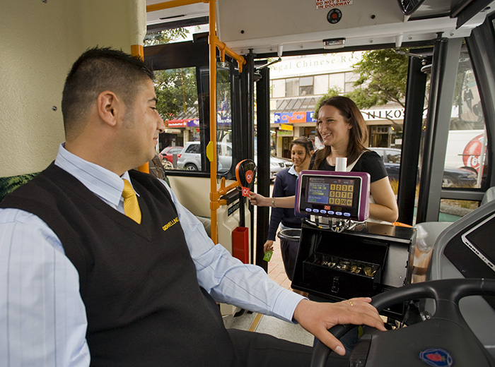 Two cities in New Zealand, Wellington and Auckland, have been using transport card systems based on Korean technology since 2008. The photo above shows commuters in Wellington using the transport card system to pay their bus fare.